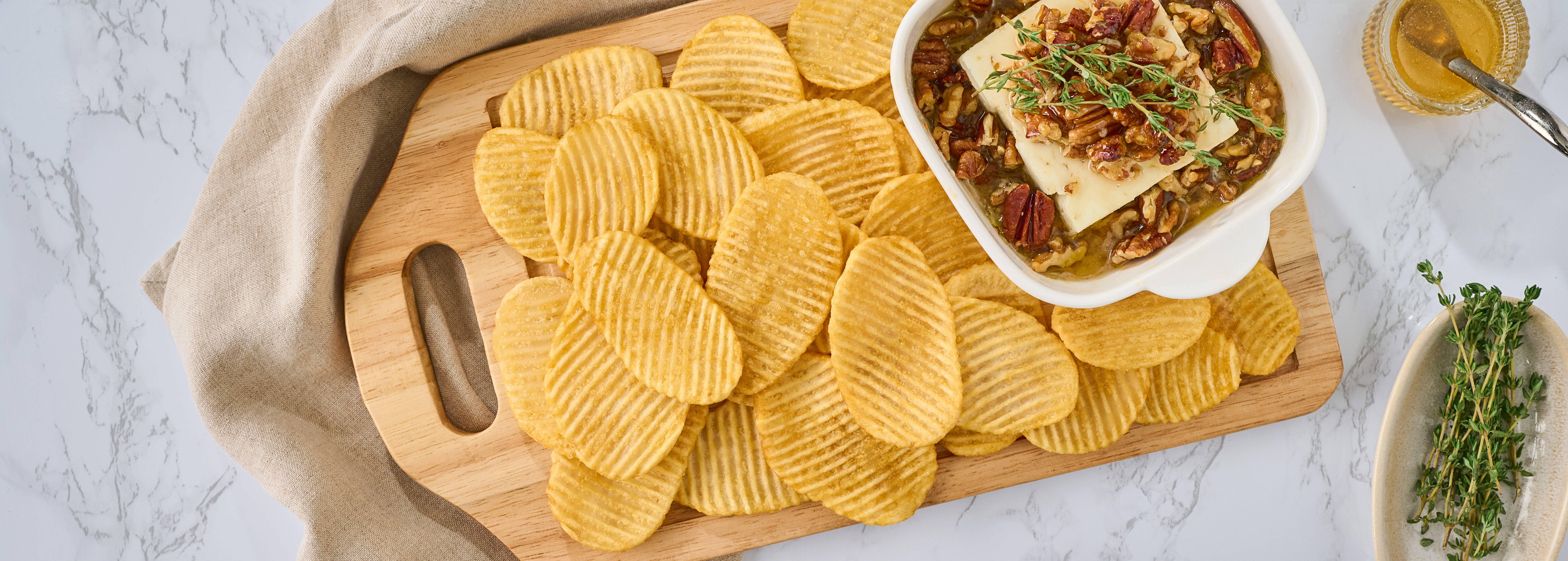 Hot Honey Baked Feta with Crinkle Chips | Cavendish Farms